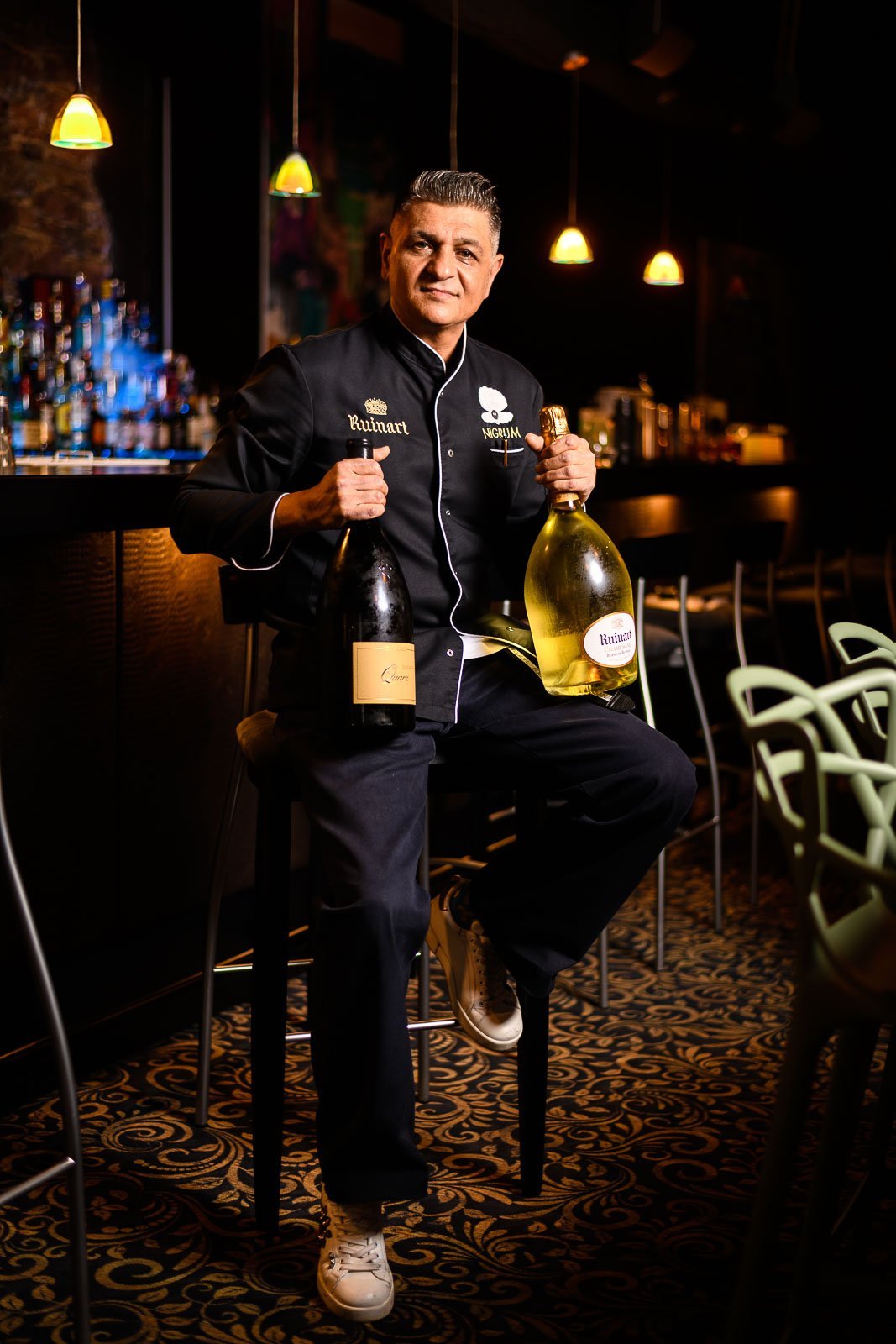 Businessporträt von Florian Bajraj, Geschäftsführer des Nigrum Restaurants in Baden-Baden, mit charismatischem Auftreten und gastronomischer Leidenschaft